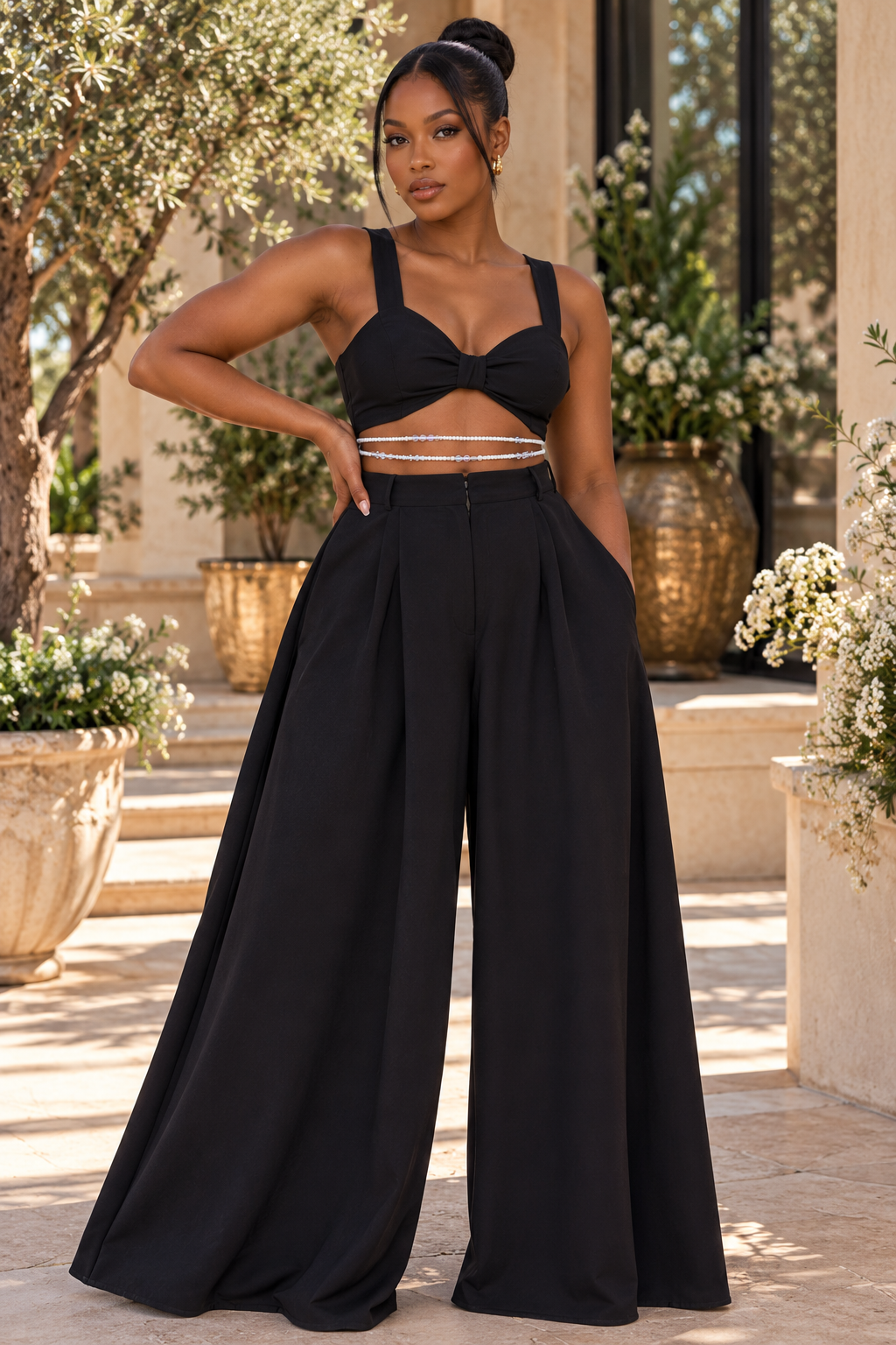 Model in a black outfit wearing Crystal Whisper white waist beads with iridescent crystal accents