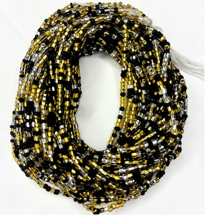 Twilight Gleam waist beads in black, silver, and gold arranged on a white background